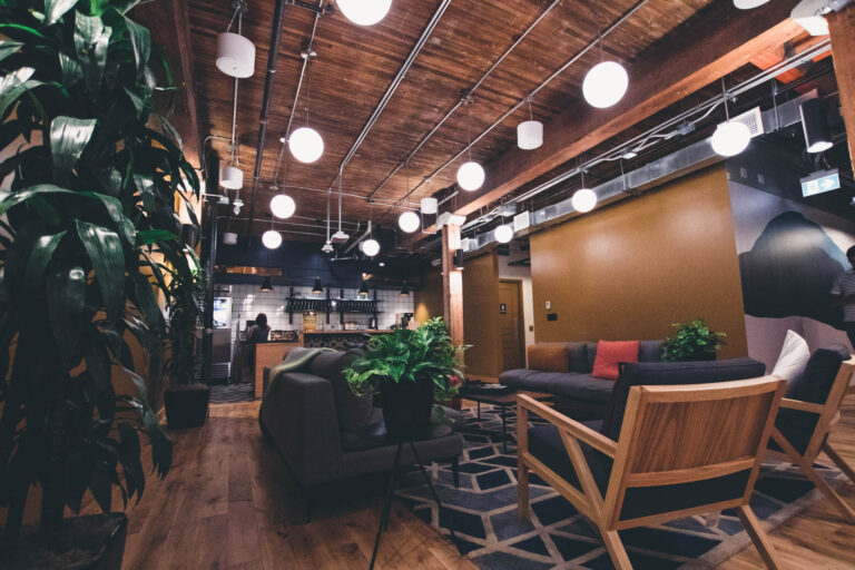 Luxe hallway with chess table flooring and large rounded windows